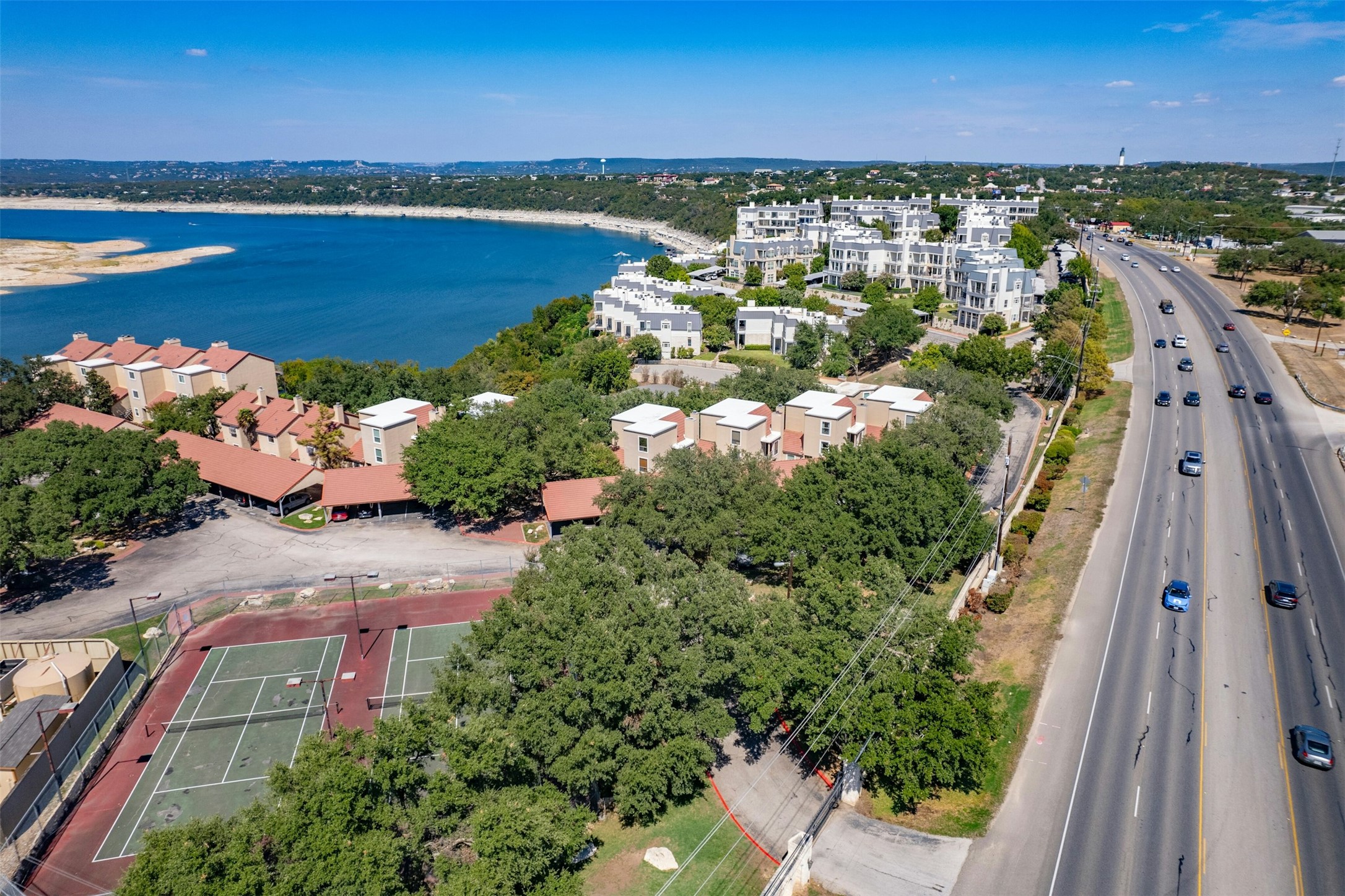 2918 Ranch To Market Road 620, Unit W219 Austin, TX 78734 - Photo 33 of 35 Bird's-eye view showing the seamless blend of lakeside living and convenient access to RR 620 and nearby shops and restaurants.