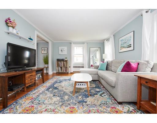 46 Stevens Road Melrose, MA 02176 - Photo 1 of 16 a living room with furniture and a flat screen tv