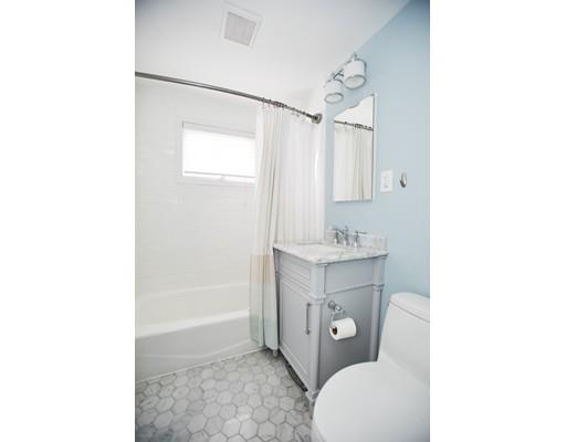 46 Stevens Road Melrose, MA 02176 - Photo 12 of 16 a bathroom with a sink a toilet and shower