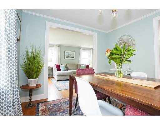 46 Stevens Road Melrose, MA 02176 - Photo 5 of 16 a living room with furniture potted plant and a wooden floor