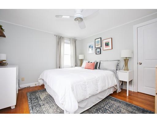 46 Stevens Road Melrose, MA 02176 - Photo 10 of 16 a bed room with a bed and a night stand