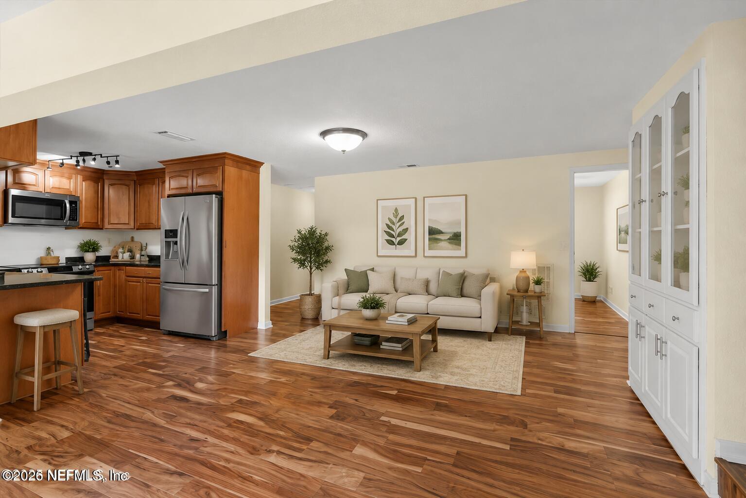 145 Finnigan Road Satsuma, FL 32189 - Photo 3 of 43 a living room with stainless steel appliances furniture a refrigerator and a kitchen counter top