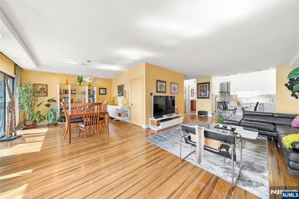 300 Gorge Road, Unit 58 Cliffside Park, NJ 07010 - Photo 16 of 32 a living room with furniture and wooden floor
