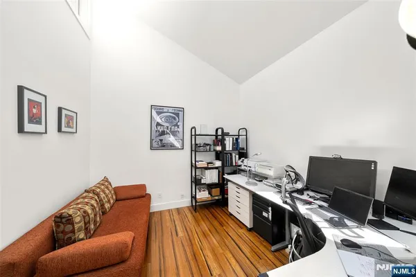 a view of an empty room with a garage