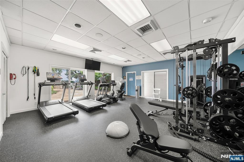 300 Gorge Road, Unit 58 Cliffside Park, NJ 07010 - Photo 29 of 32 a view of a room with gym equipment