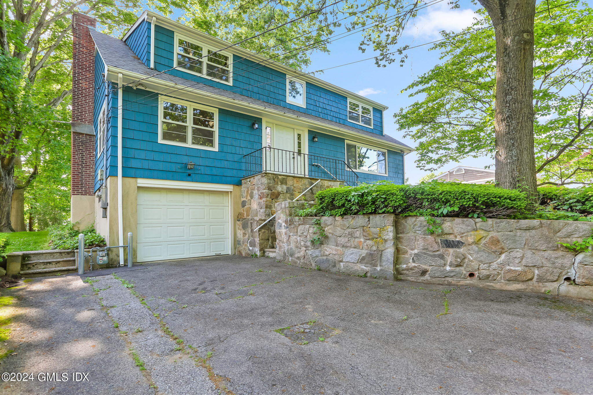 38 Maplewood Drive Cos Cob, CT 06807 - Photo 2 of 24 a view of a house with a yard