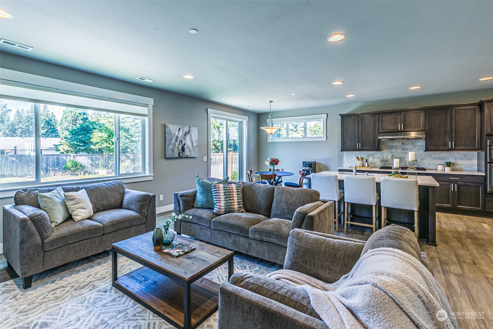 4918 Northeast 1st Street Renton, WA 98059 - Photo 11 of 40 a living room with furniture and a large window