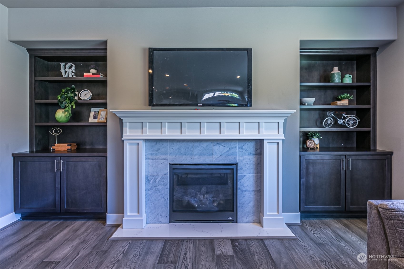 4918 Northeast 1st Street Renton, WA 98059 - Photo 14 of 40 a living room with furniture and a fireplace