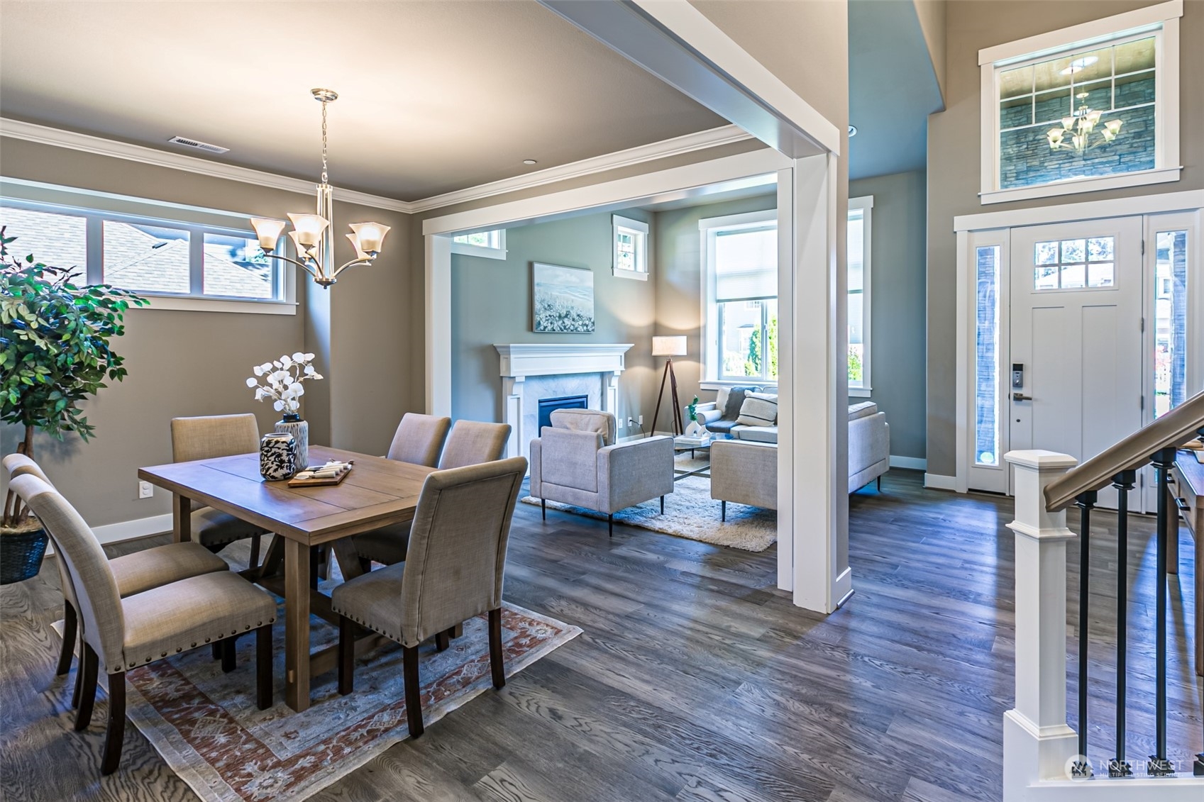 4918 Northeast 1st Street Renton, WA 98059 - Photo 17 of 40 a view of a dining room with furniture window and wooden floor