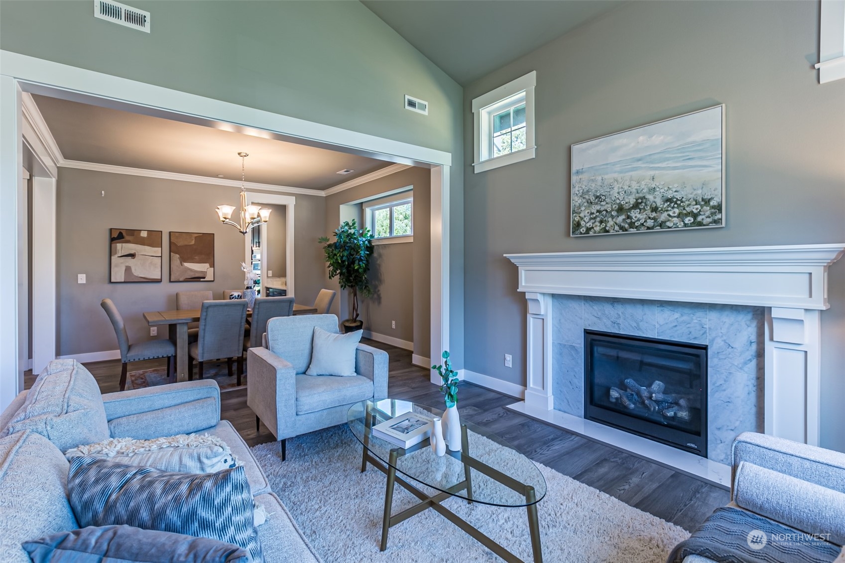 4918 Northeast 1st Street Renton, WA 98059 - Photo 19 of 40 a living room with furniture and a fireplace