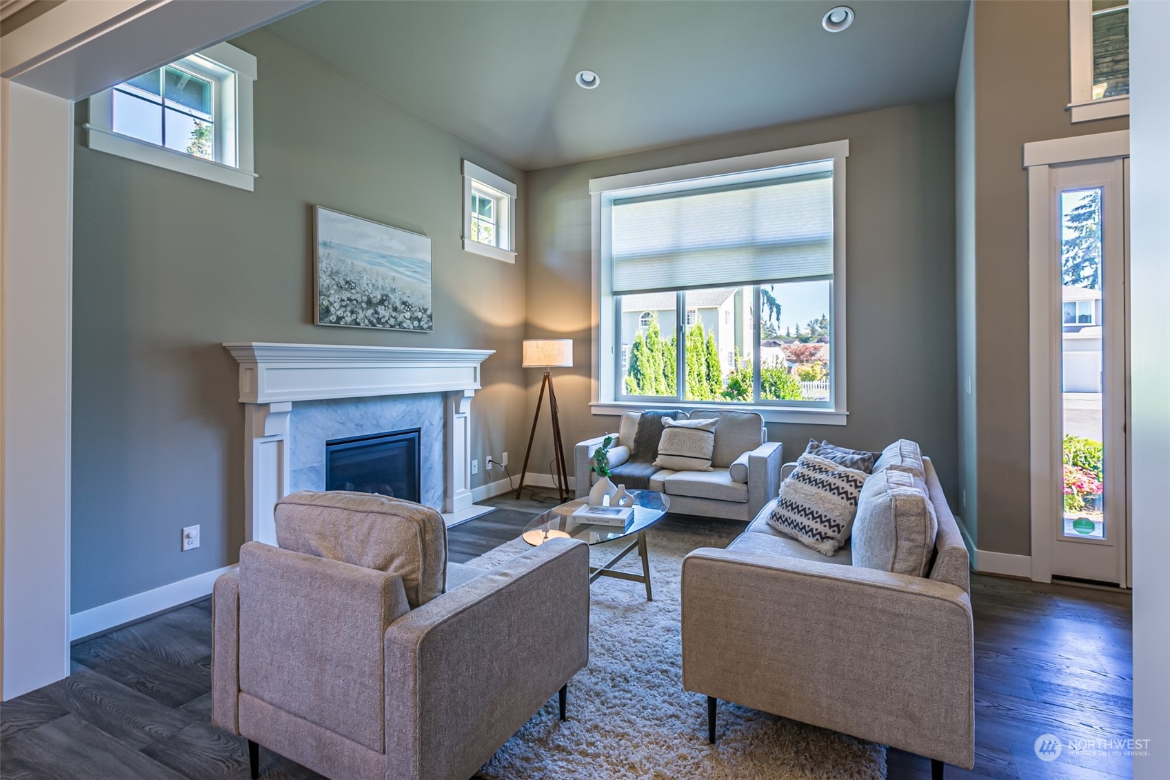 4918 Northeast 1st Street Renton, WA 98059 - Photo 21 of 40 a living room with furniture and a fireplace
