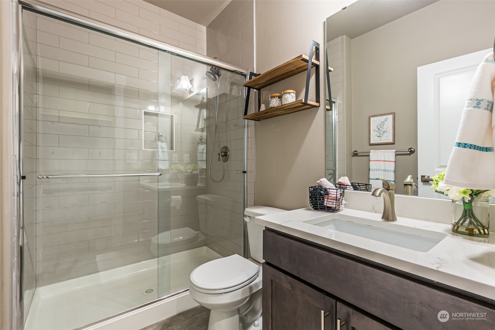 4918 Northeast 1st Street Renton, WA 98059 - Photo 24 of 40 a bathroom with a sink toilet and shower