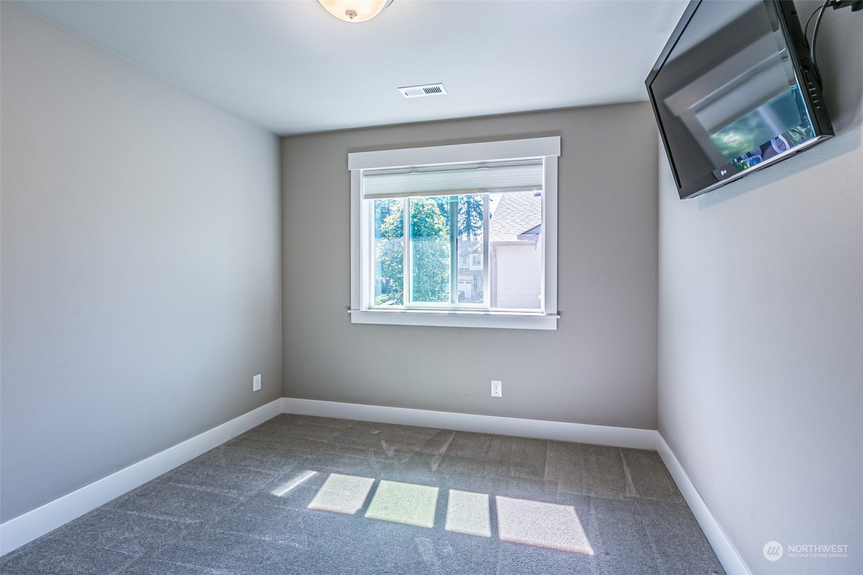 4918 Northeast 1st Street Renton, WA 98059 - Photo 30 of 40 an empty room with a window