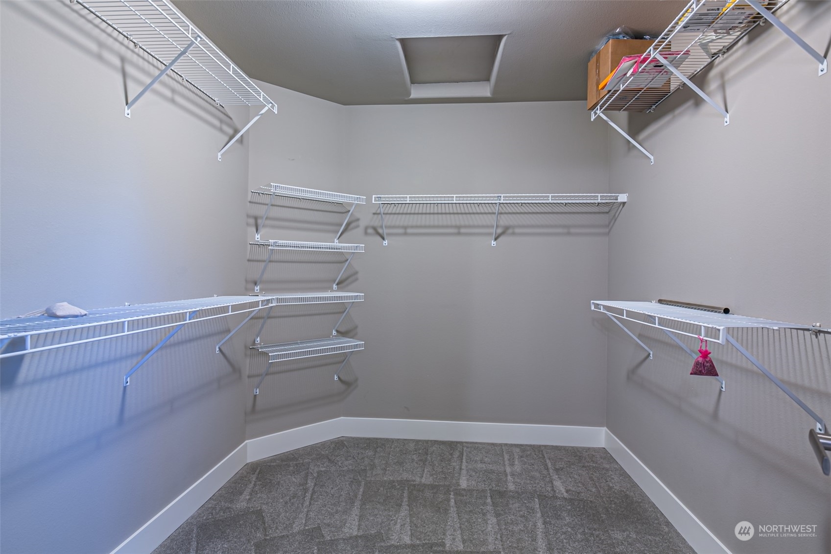 4918 Northeast 1st Street Renton, WA 98059 - Photo 34 of 40 a view of storage and utility room with racks on the wall