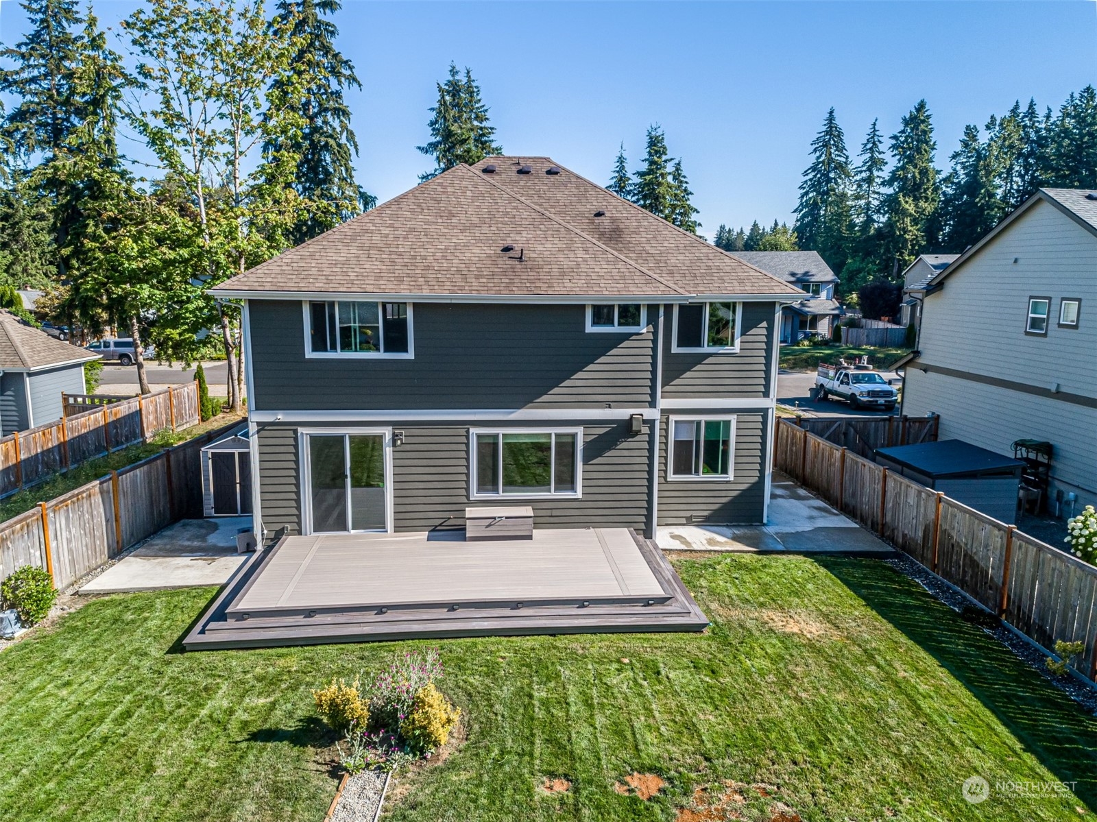 4918 Northeast 1st Street Renton, WA 98059 - Photo 38 of 40 a front view of a house with yard patio and green space