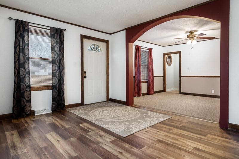 207 River Park Road Loves Park, IL 61111 - Photo 12 of 41 a view of a room with wooden floor and cabinet