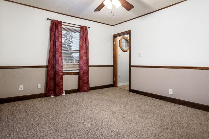 207 River Park Road Loves Park, IL 61111 - Photo 14 of 41 a view of an empty room with a window