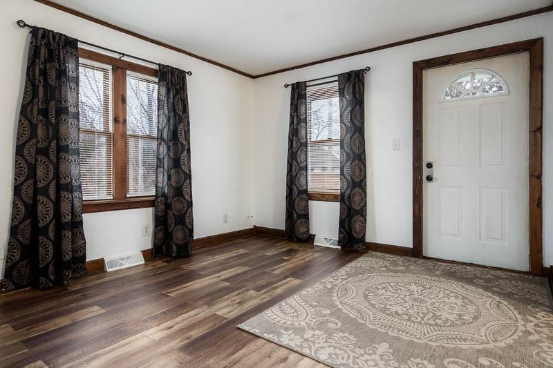 207 River Park Road Loves Park, IL 61111 - Photo 10 of 41 an empty room with windows and closet