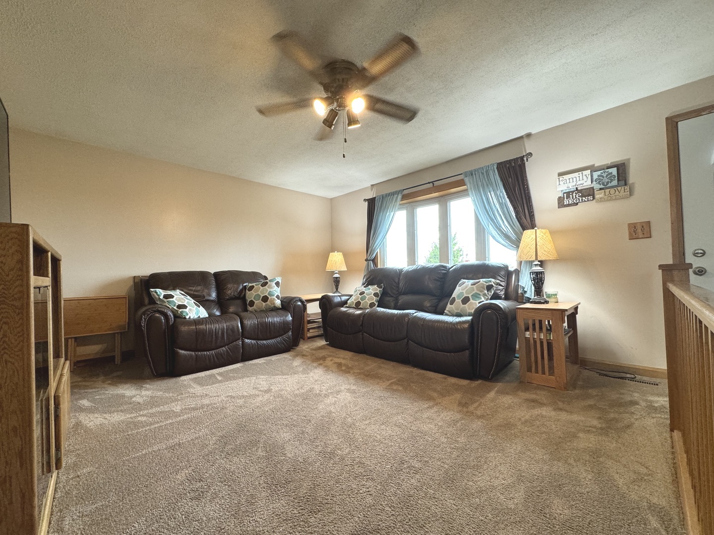 5382 South 2000W Road Chebanse, IL 60922 - Photo 11 of 54 a living room with furniture and a chandelier