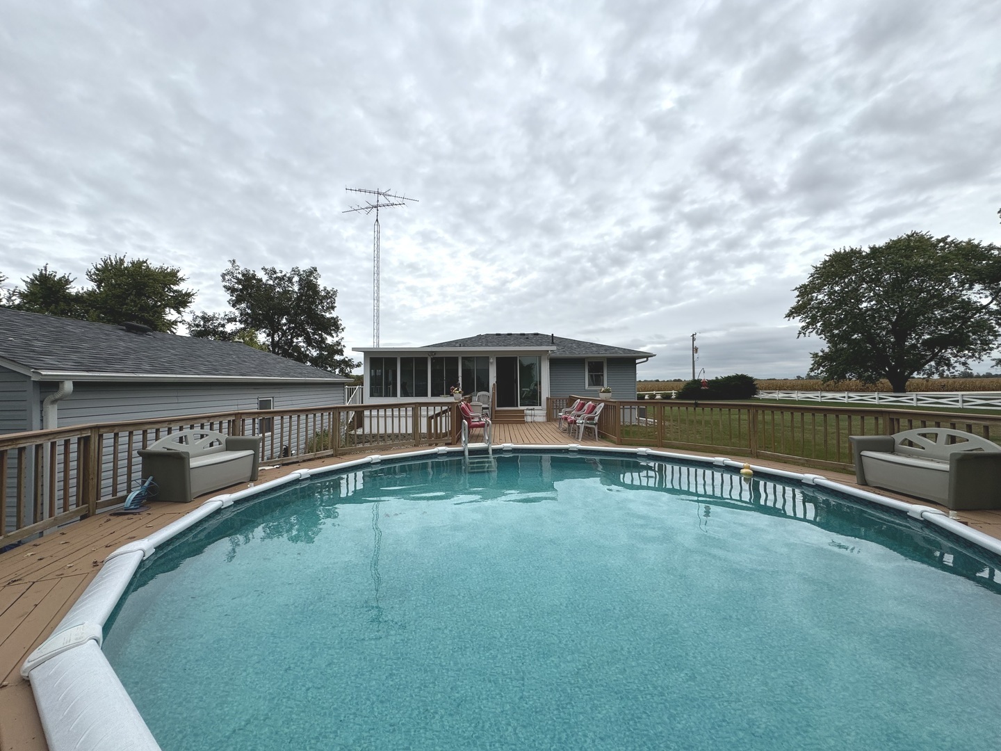 5382 South 2000W Road Chebanse, IL 60922 - Photo 40 of 54 a view of a house with swimming pool and porch
