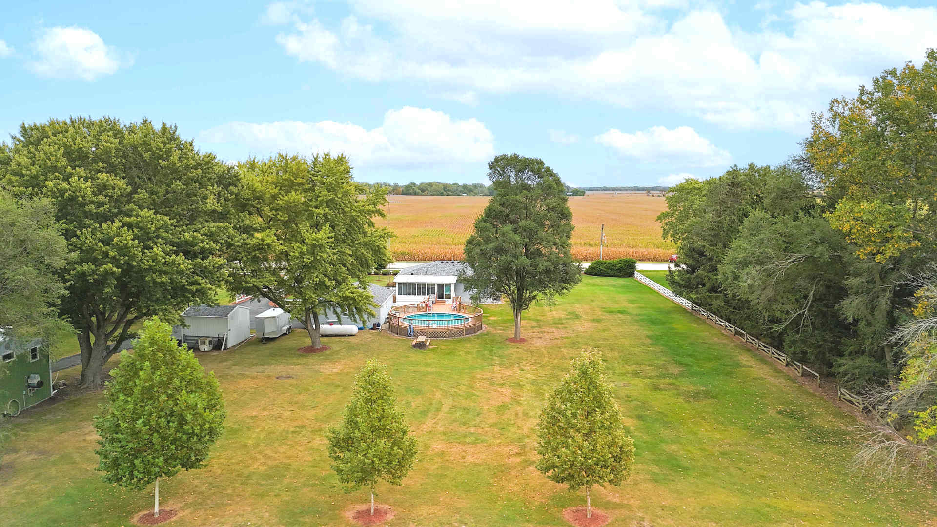 5382 South 2000W Road Chebanse, IL 60922 - Photo 5 of 54 a view of a house with pool and trees