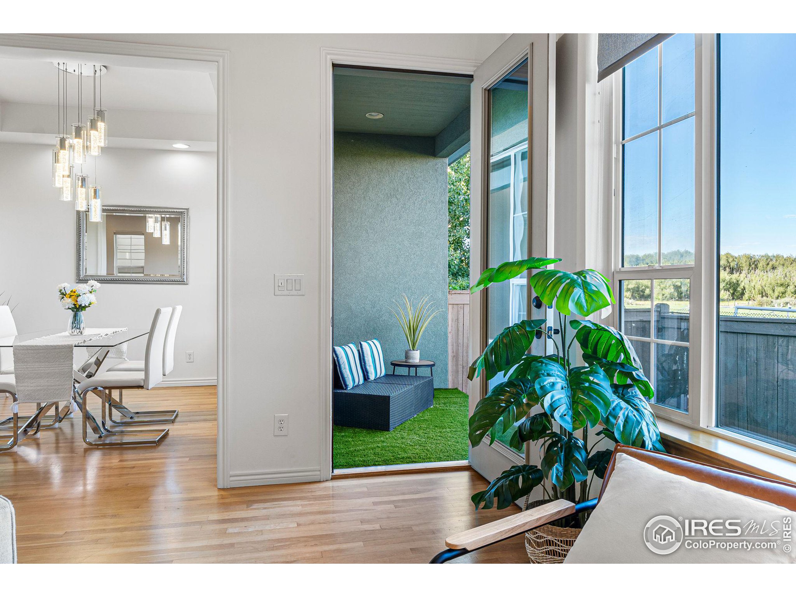 3766 Ridgeway Street Boulder, CO 80301 - Photo 11 of 42 a living room with furniture and a potted plant