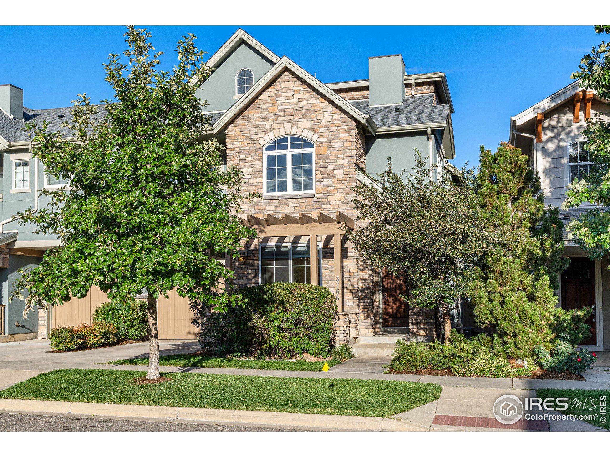 3766 Ridgeway Street Boulder, CO 80301 - Photo 16 of 42 a front view of a house with a yard