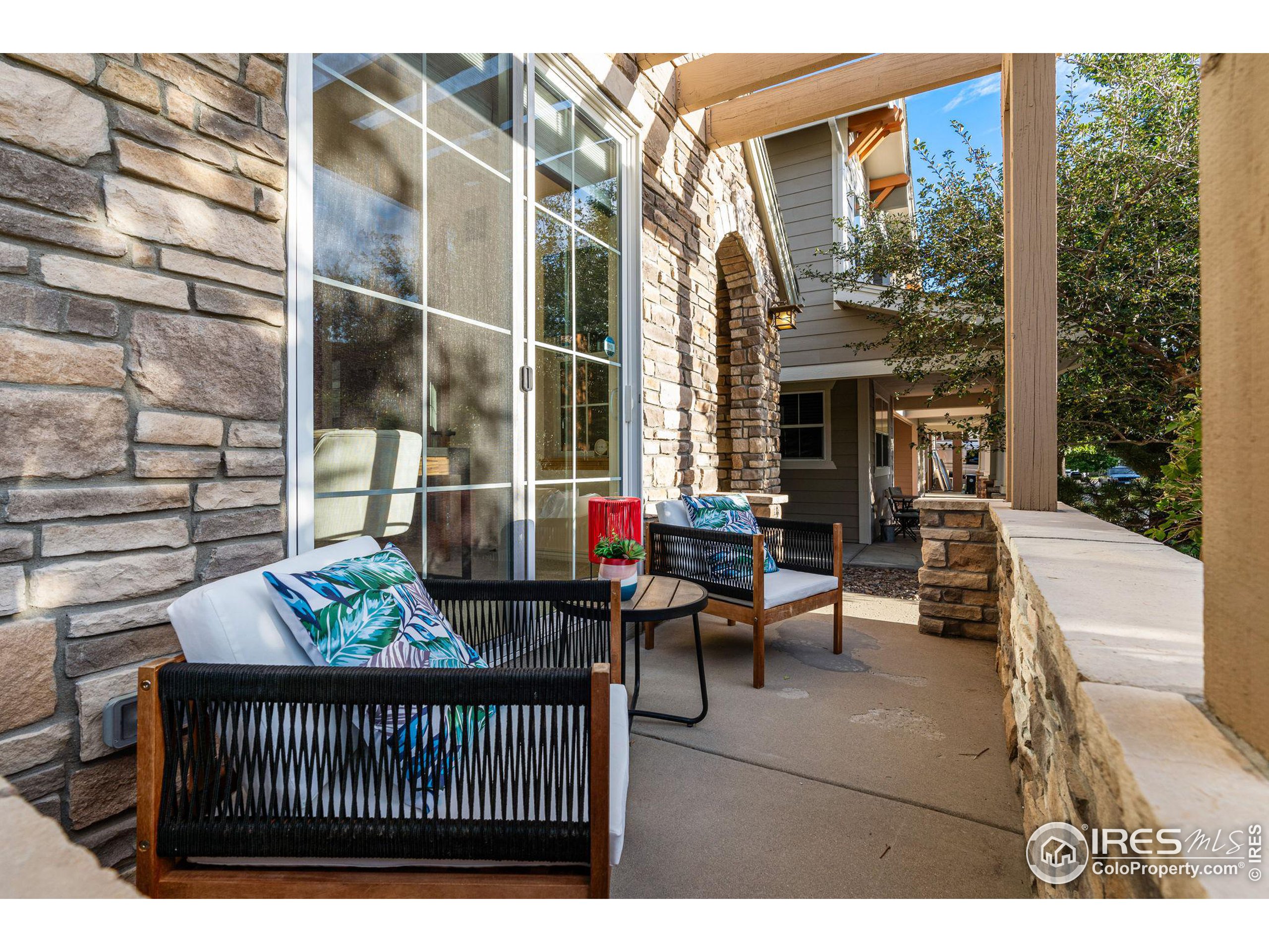 3766 Ridgeway Street Boulder, CO 80301 - Photo 19 of 42 a view of a patio with couches table and chairs and potted plants