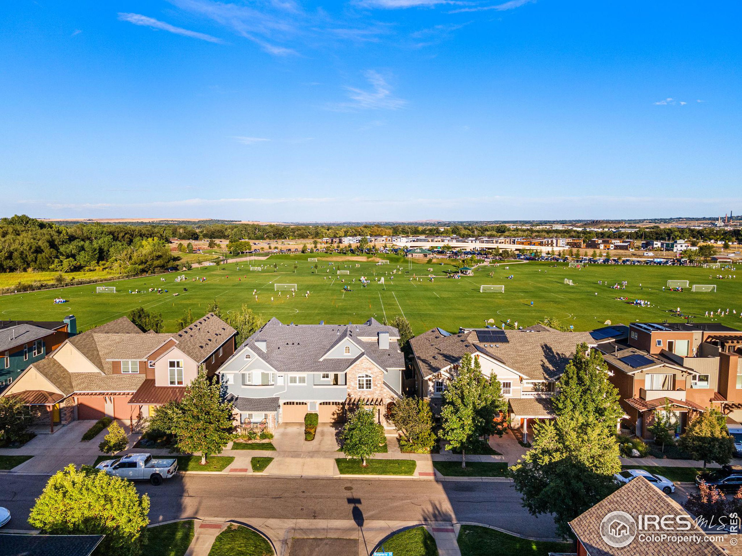3766 Ridgeway Street Boulder, CO 80301 - Photo 40 of 42 an aerial view of residential building and lake view