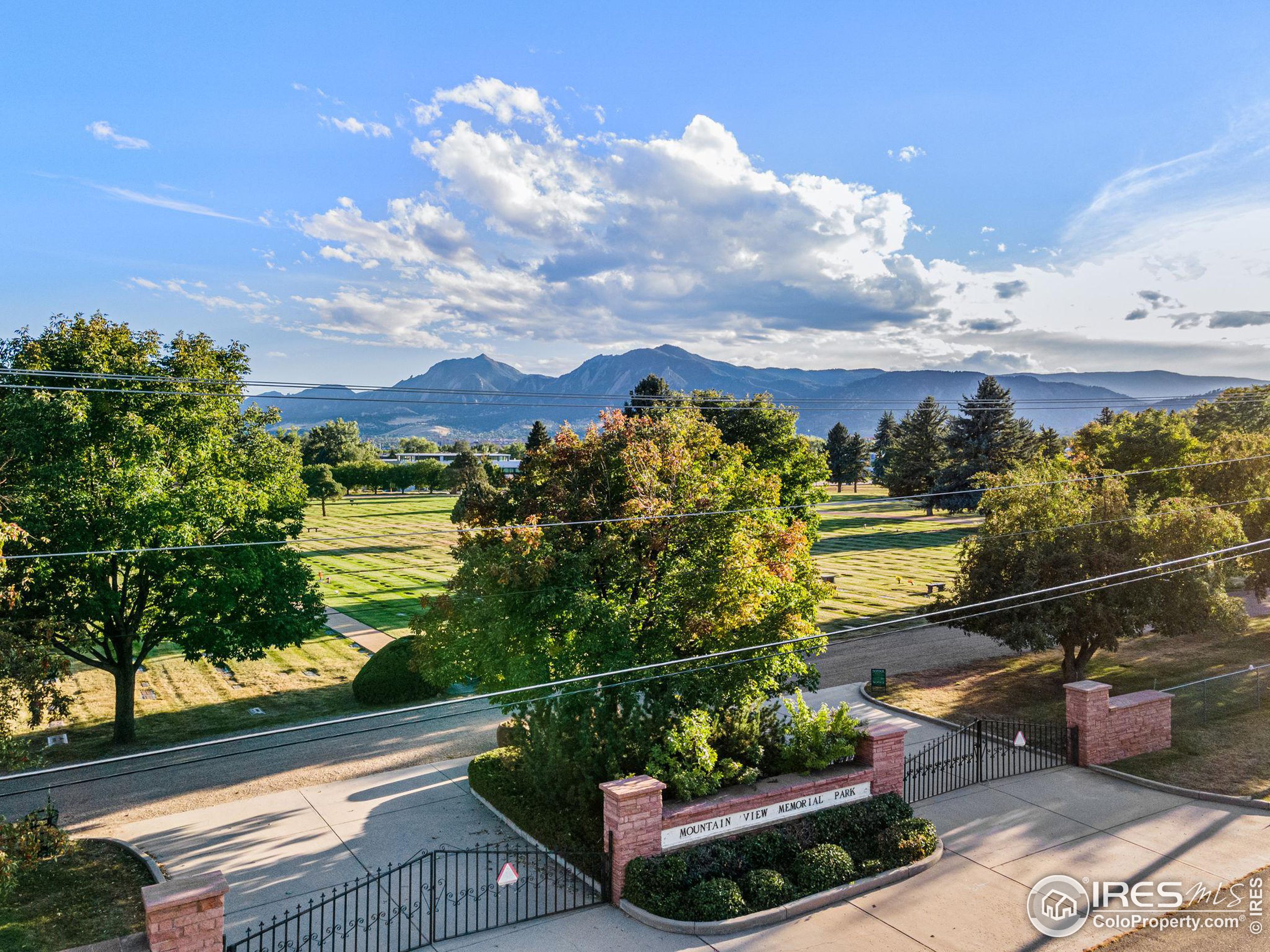 3766 Ridgeway Street Boulder, CO 80301 - Photo 42 of 42 a view of a terrace with couches and wooden floor