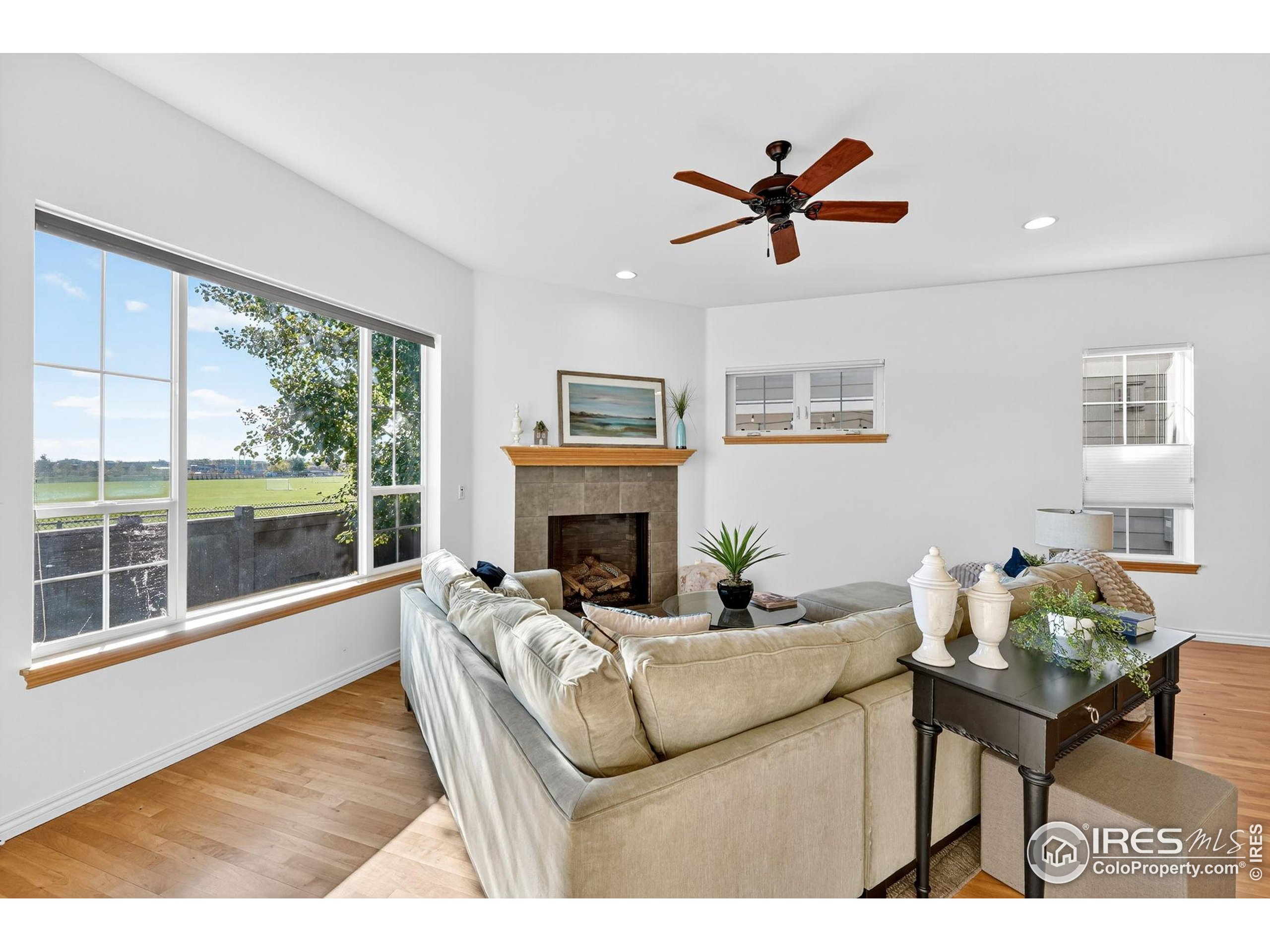 3766 Ridgeway Street Boulder, CO 80301 - Photo 5 of 42 a living room with furniture and a fireplace