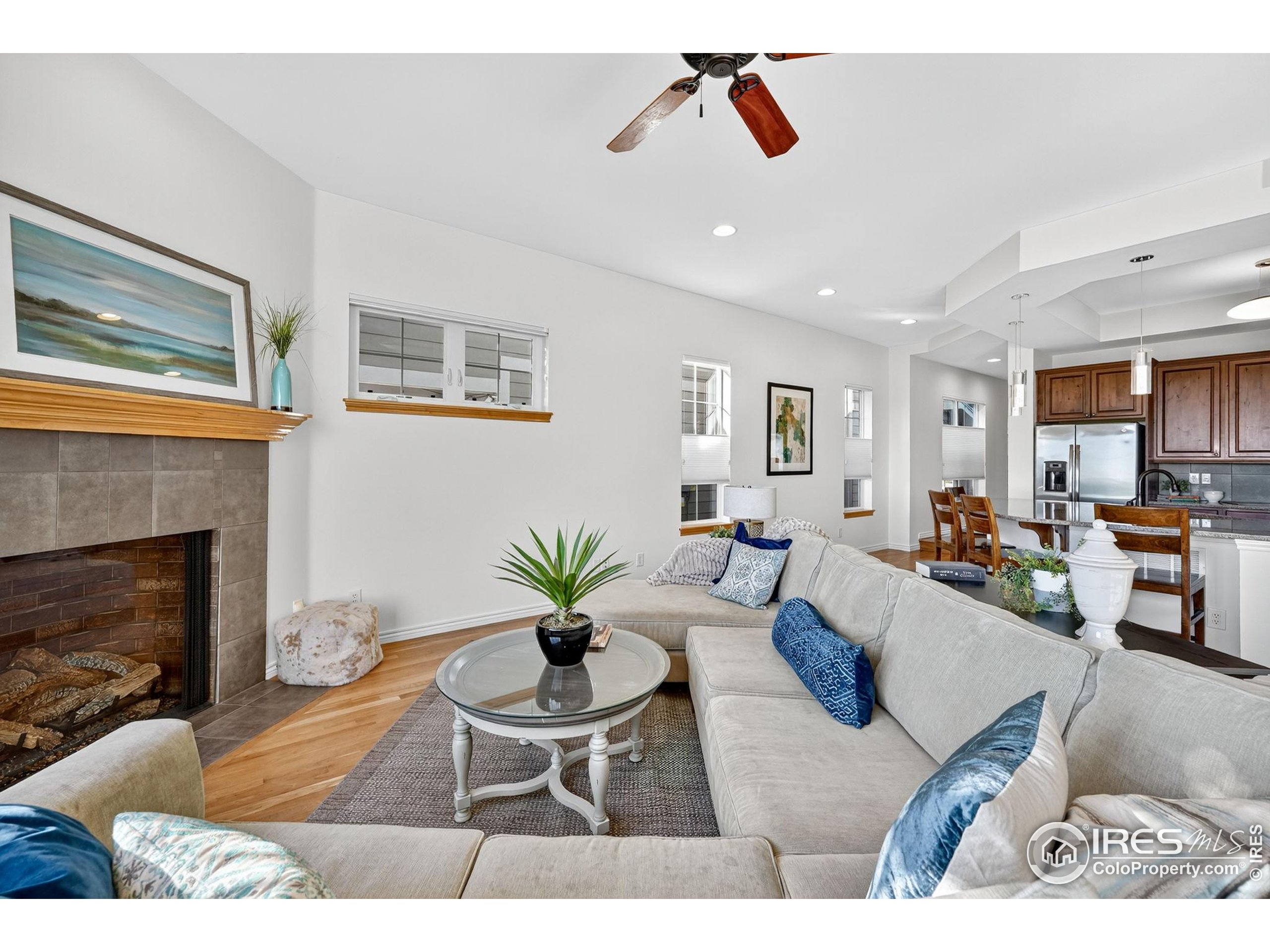 3766 Ridgeway Street Boulder, CO 80301 - Photo 7 of 42 a living room with furniture and a fireplace