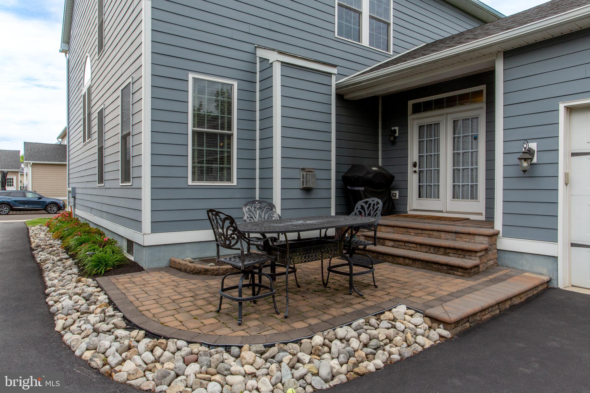 4682 Plough Tavern Road Doylestown, PA 18902 - Photo 38 of 42 a backyard of a house with outdoor seating