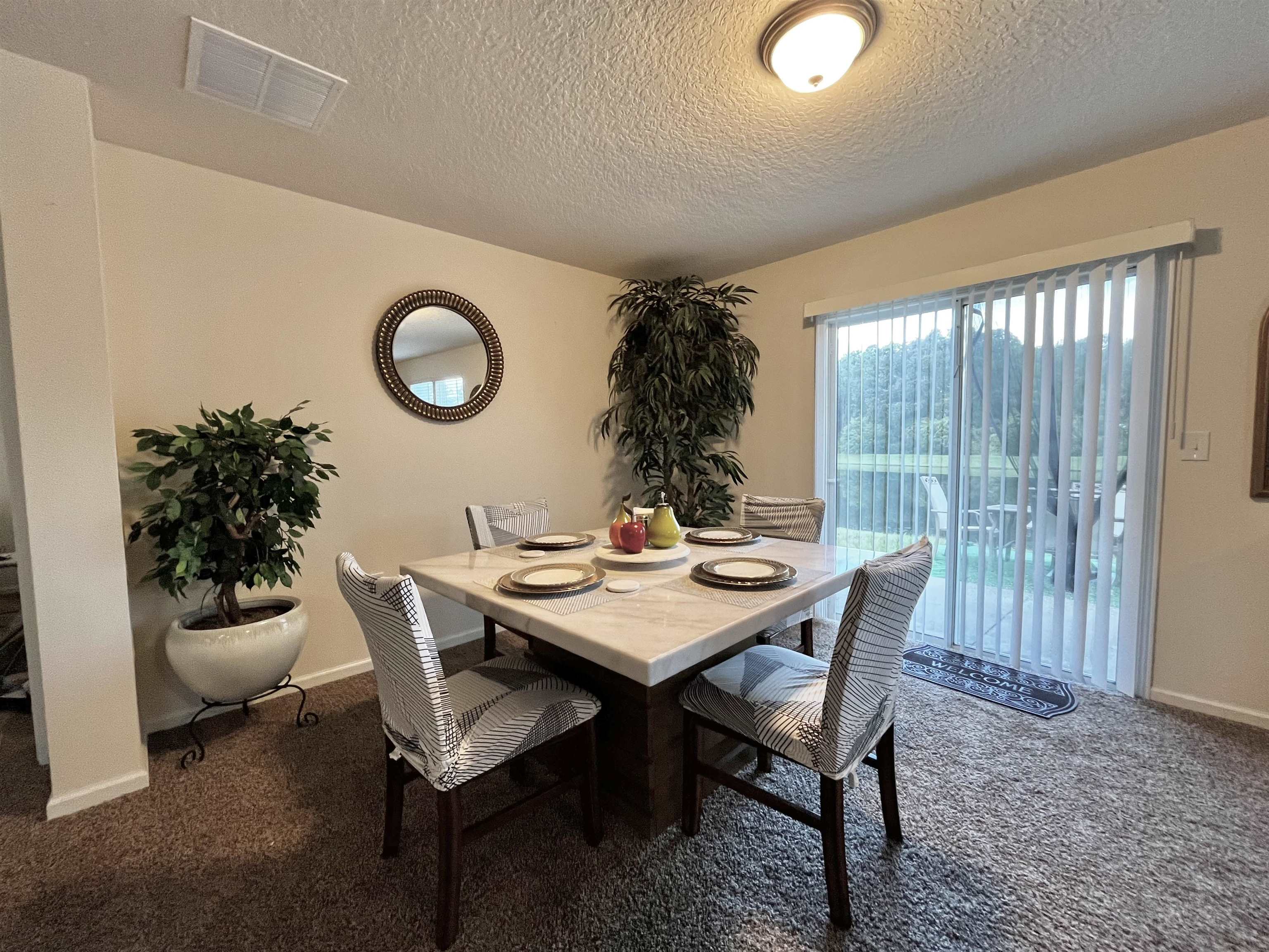 124 Cody Street St. Augustine, FL 32084 - Photo 6 of 8 a view of a dining room with furniture and window