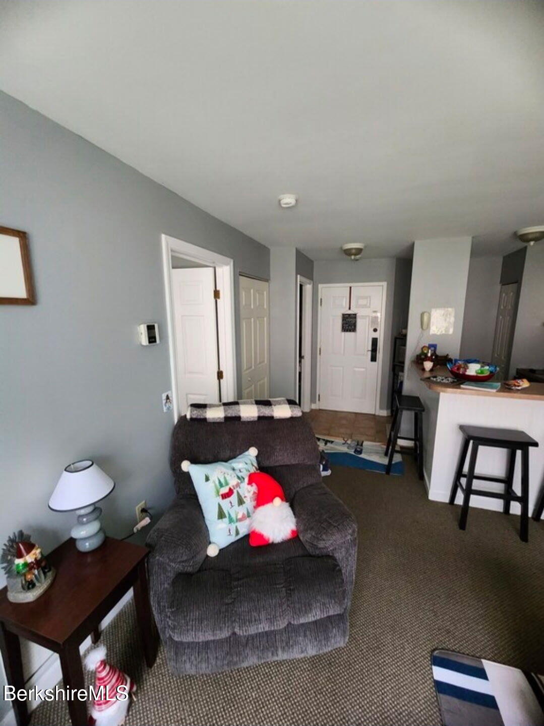 37 Corey Road, Unit 521 Hancock, MA 01237 - Photo 6 of 18 a living room with furniture and a table