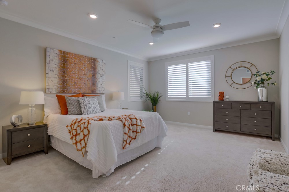 136 Tribeca Irvine, CA 92612 - Photo 24 of 70 a bedroom with a bed and a window