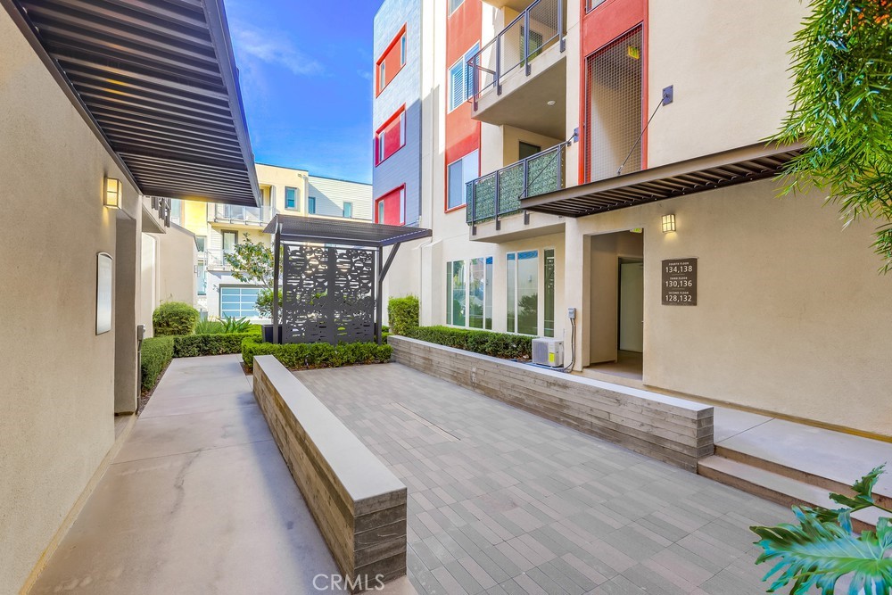 136 Tribeca Irvine, CA 92612 - Photo 51 of 70 a view of a brick building with many windows