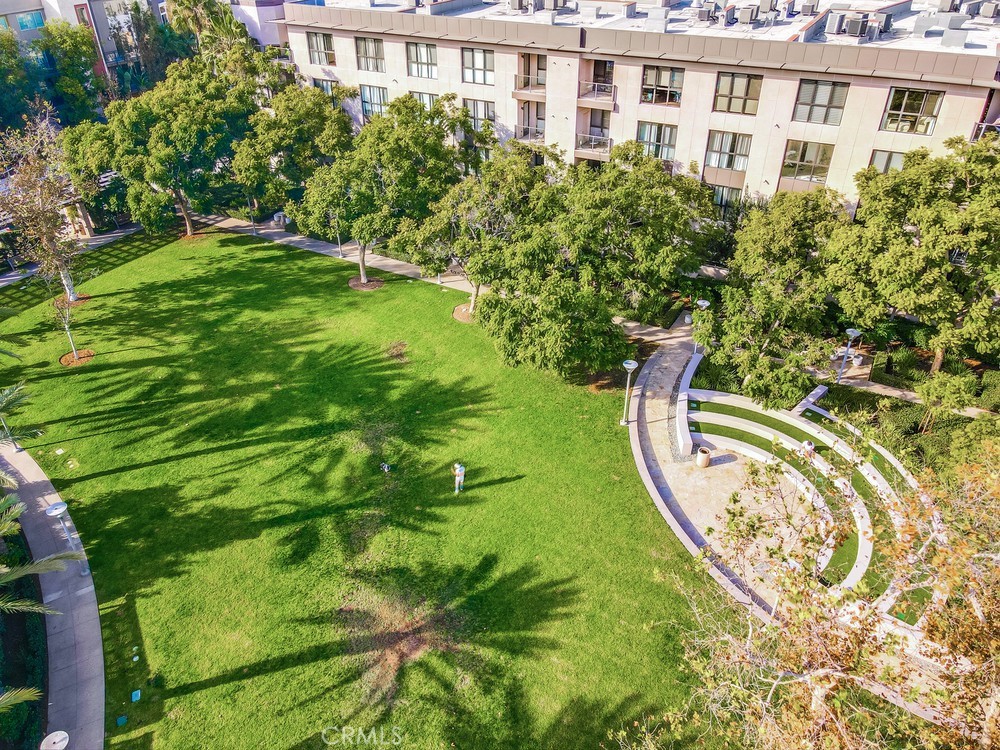 136 Tribeca Irvine, CA 92612 - Photo 59 of 70 a view of a swimming pool with a garden
