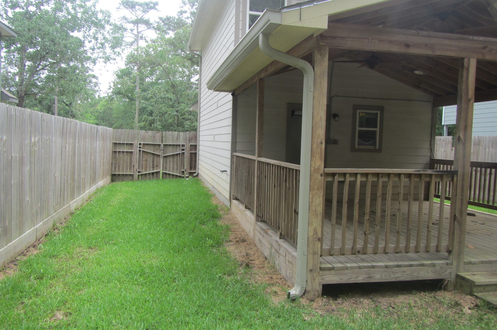 28612 Netawake Court Point Blank, TX 77364 - Photo 3 of 14 a view of backyard with deck