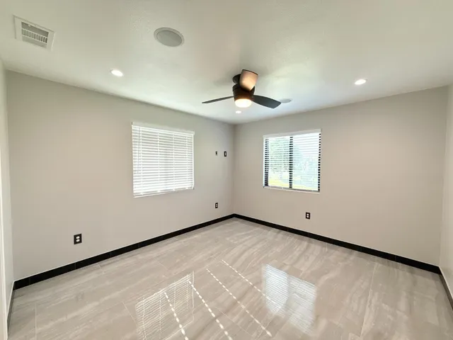 an empty room with a natural light