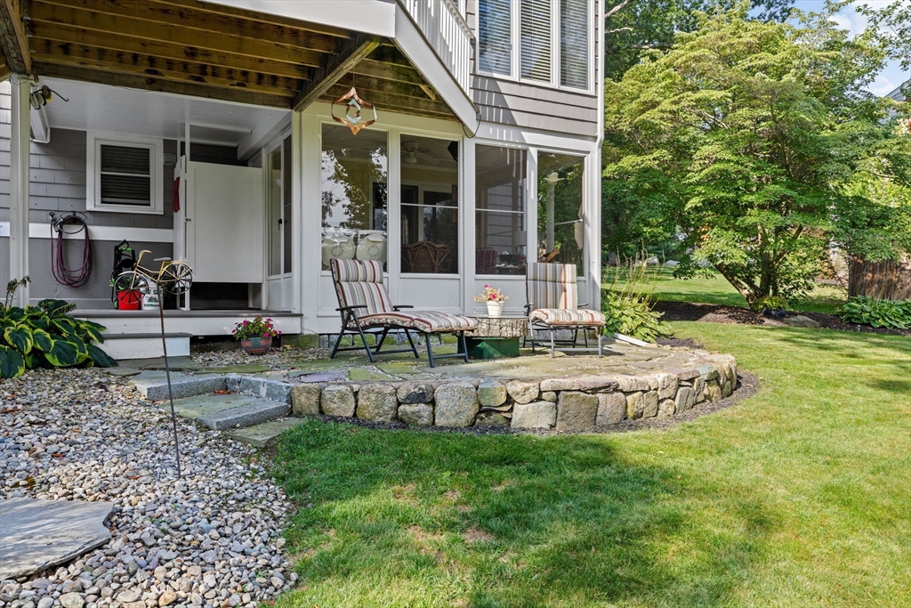14 Aberdeen Drive Scituate, MA 02066 - Photo 30 of 42 a front view of a house with garden