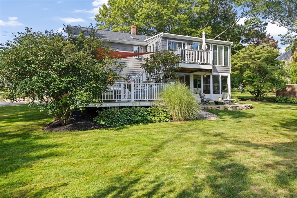 14 Aberdeen Drive Scituate, MA 02066 - Photo 37 of 42 a front view of house with yard and trees