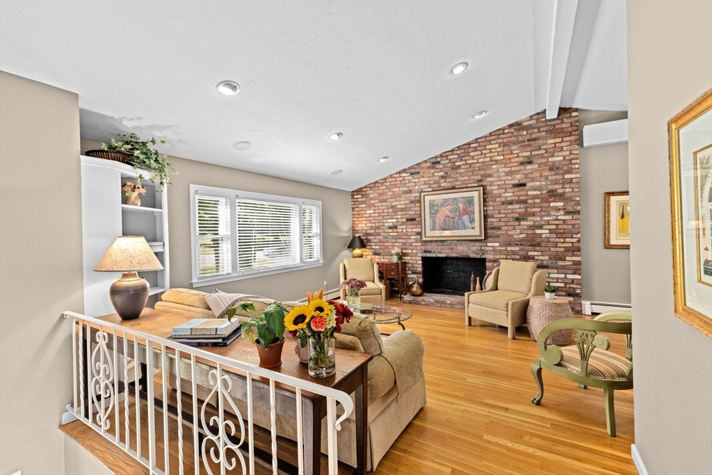 14 Aberdeen Drive Scituate, MA 02066 - Photo 5 of 42 a bedroom with furniture and a fireplace