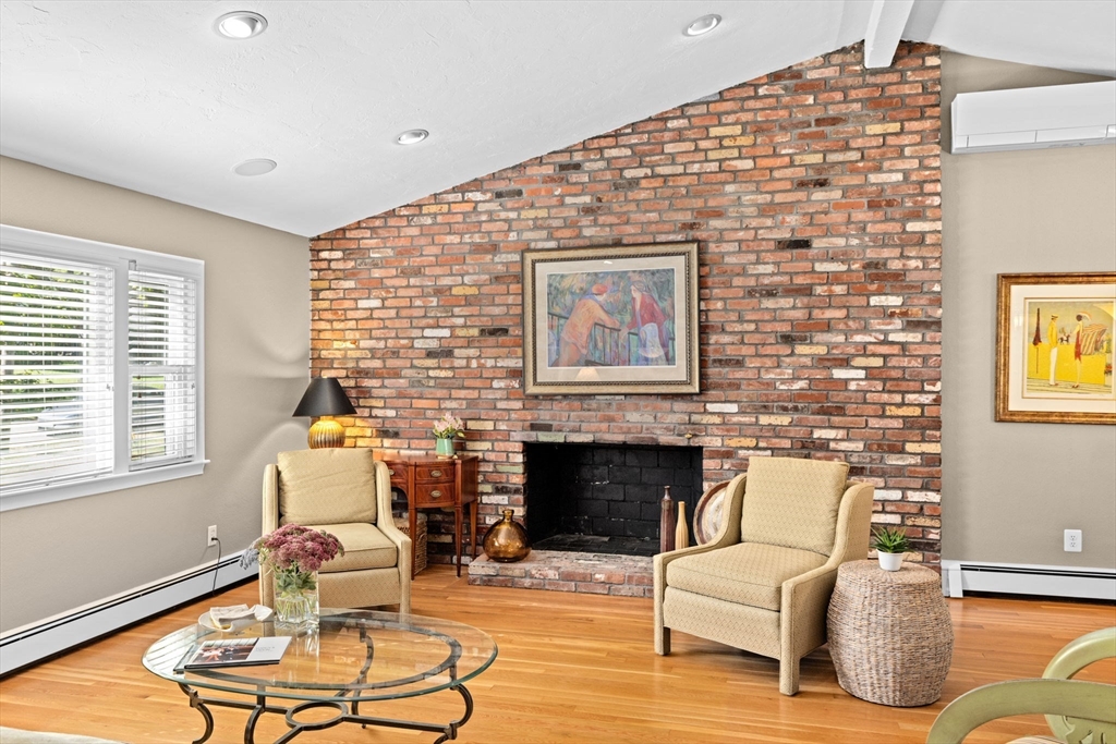 14 Aberdeen Drive Scituate, MA 02066 - Photo 6 of 42 a living room with furniture and a fireplace