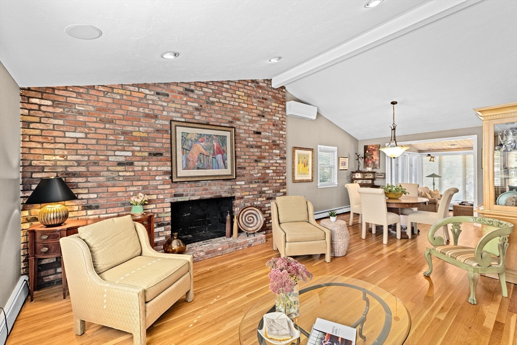 14 Aberdeen Drive Scituate, MA 02066 - Photo 7 of 42 a living room with furniture fireplace and wooden floor