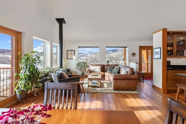 a kitchen with stainless steel appliances kitchen island granite countertop a sink and cabinets
