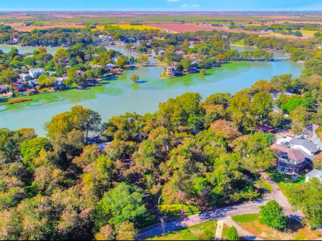 1263 Terminal Loop Road McQueeney, TX 78123 - Photo 2 of 33 a view of a houses with a lake view