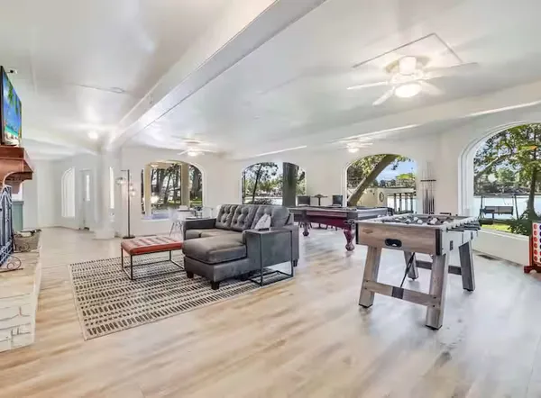 a living room with furniture and a table
