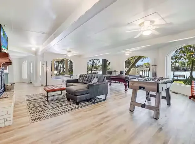 a living room with furniture and a table