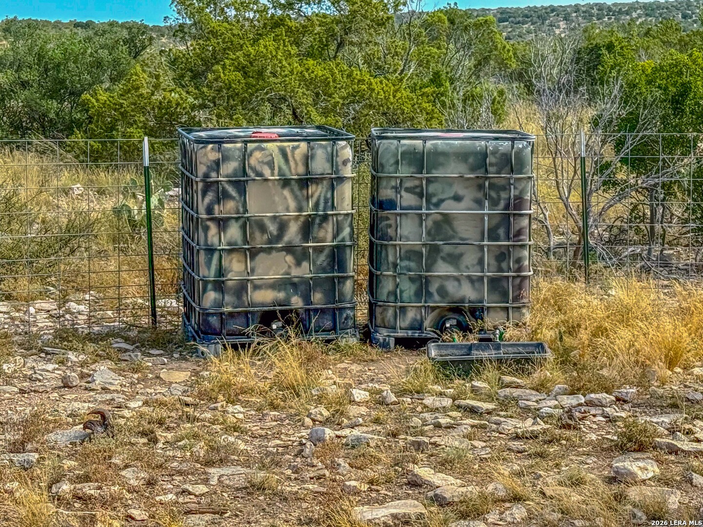 0 West Cooper Road Comstock, TX 78837 - Photo 3 of 49 a backyard of a house with barbeque oven